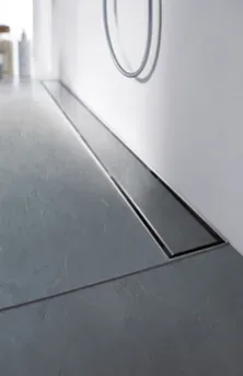 Flīzēts dušas traps